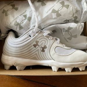 Brand new in box cleats  .
